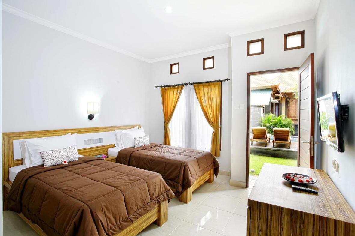 Tanjung Sari Inn Νούσα Ντούα Δωμάτιο φωτογραφία